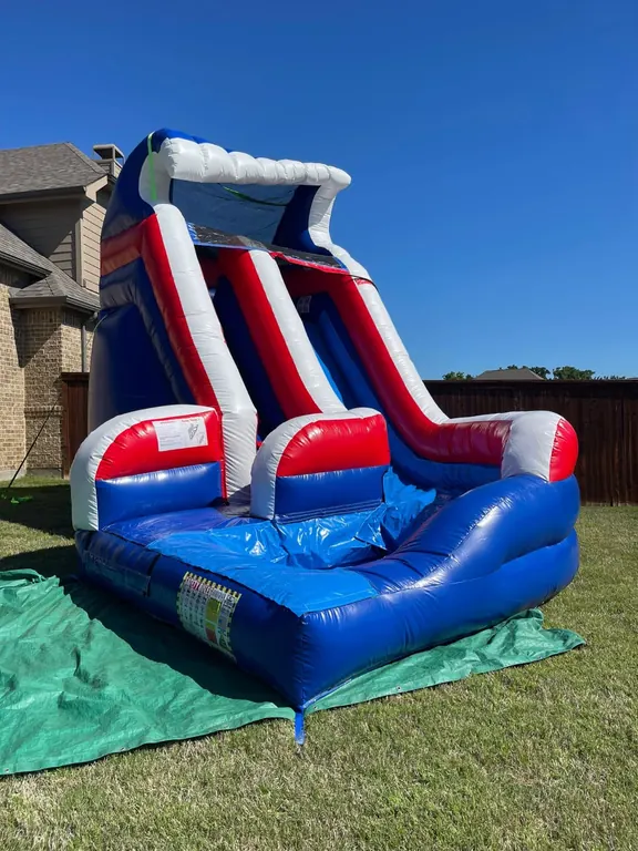 Blue and white inflatable water slide rental