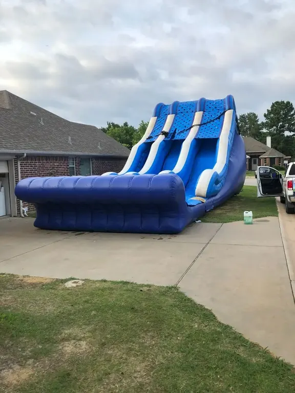 Large blue inflatable water slide rental